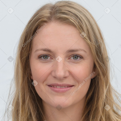 Joyful white young-adult female with long  brown hair and grey eyes