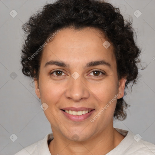 Joyful white adult female with short  brown hair and brown eyes