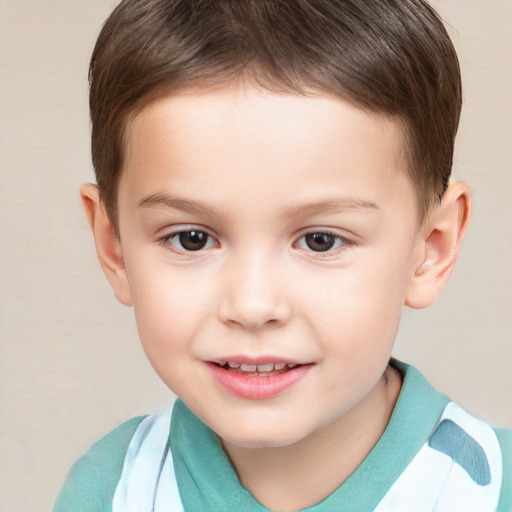 Joyful white child male with short  brown hair and brown eyes