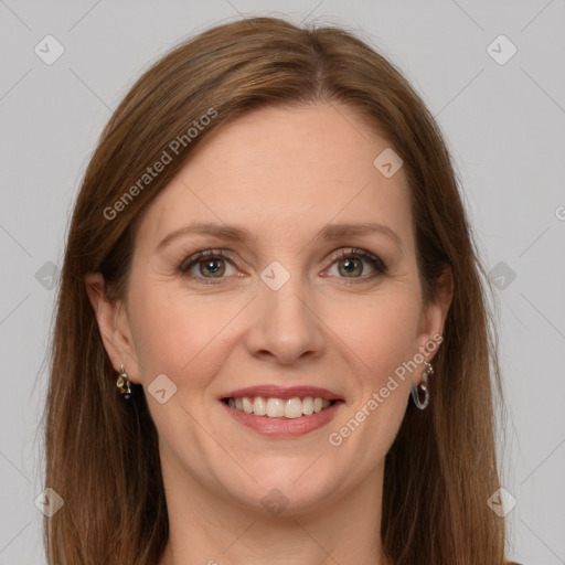 Joyful white adult female with long  brown hair and grey eyes