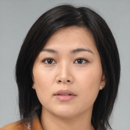 Neutral asian young-adult female with medium  black hair and brown eyes