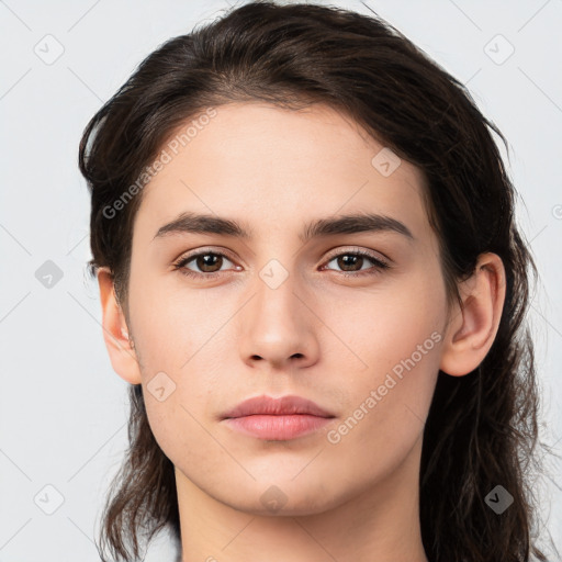 Neutral white young-adult female with long  brown hair and brown eyes