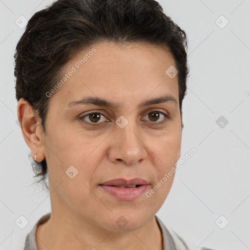 Joyful white adult female with short  brown hair and brown eyes