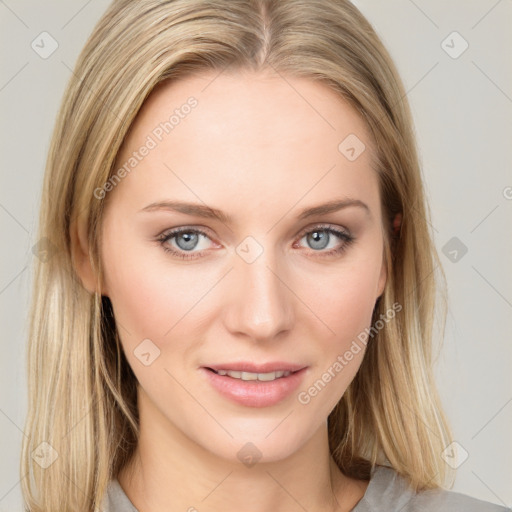 Joyful white young-adult female with long  brown hair and blue eyes