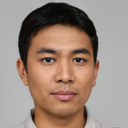 Neutral asian young-adult male with short  black hair and brown eyes