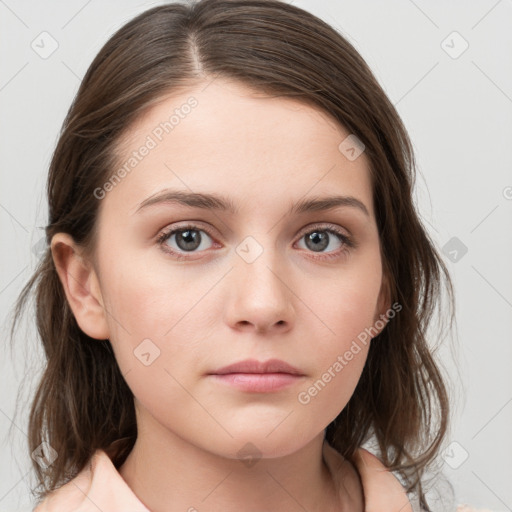 Neutral white young-adult female with medium  brown hair and brown eyes