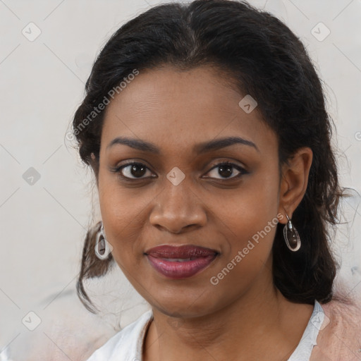 Joyful black young-adult female with medium  brown hair and brown eyes