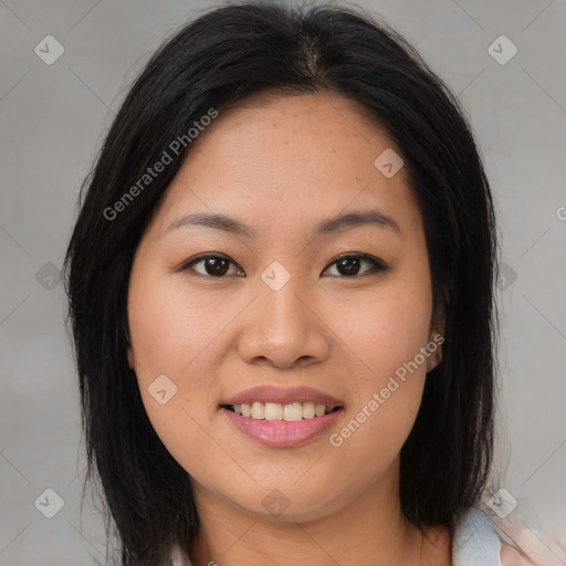 Joyful asian young-adult female with medium  brown hair and brown eyes