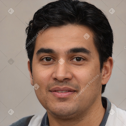 Joyful white young-adult male with short  black hair and brown eyes