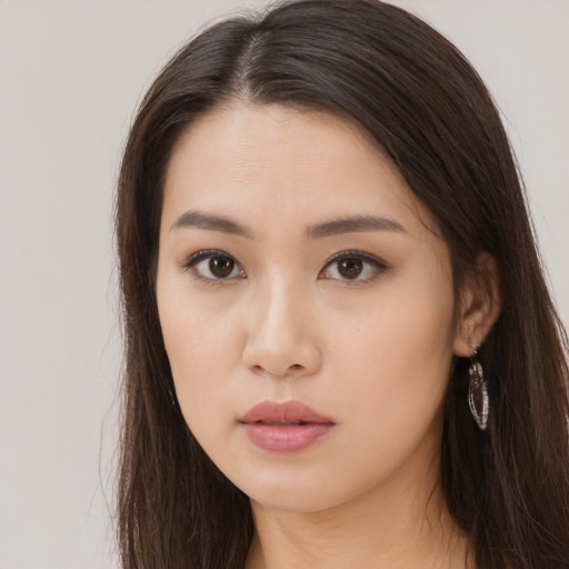 Neutral asian young-adult female with long  brown hair and brown eyes