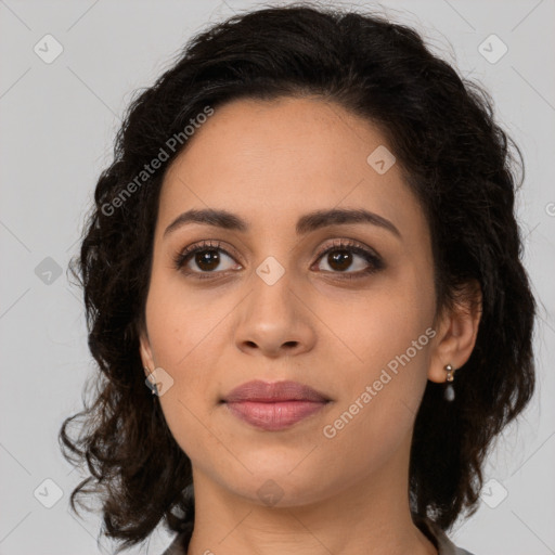 Joyful latino young-adult female with medium  brown hair and brown eyes