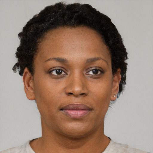 Neutral black young-adult female with short  brown hair and brown eyes
