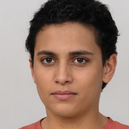 Neutral latino young-adult male with short  brown hair and brown eyes