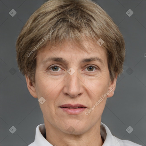 Joyful white adult female with short  brown hair and brown eyes