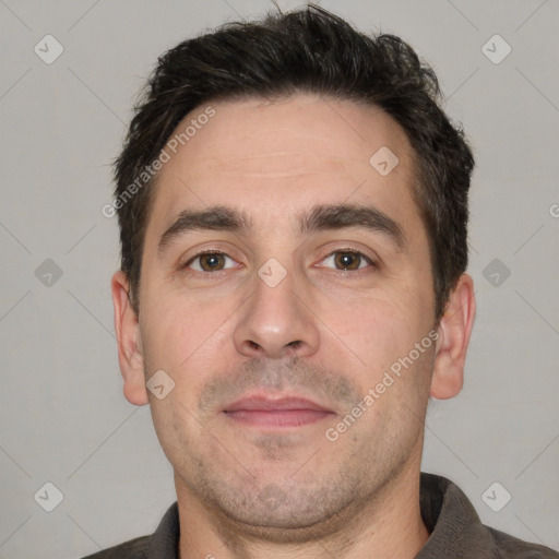 Neutral white adult male with short  black hair and brown eyes