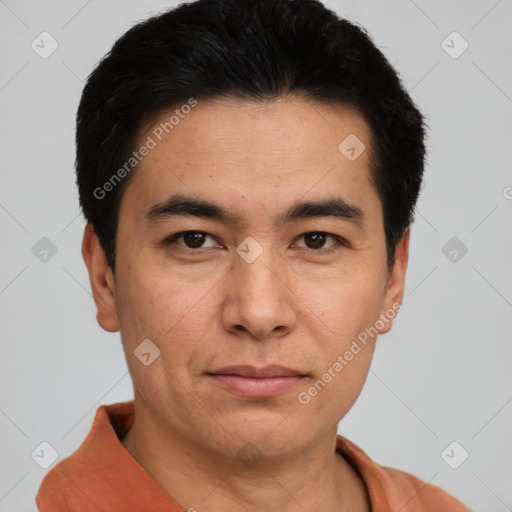 Joyful asian young-adult male with short  black hair and brown eyes