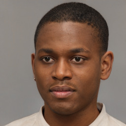 Neutral latino young-adult male with short  brown hair and brown eyes