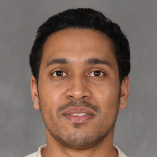 Neutral latino young-adult male with short  black hair and brown eyes