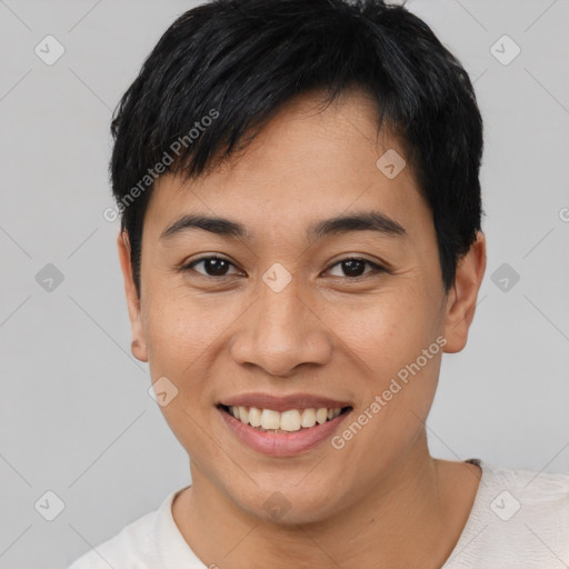 Joyful asian young-adult female with short  black hair and brown eyes