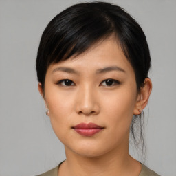 Neutral asian young-adult female with medium  black hair and brown eyes