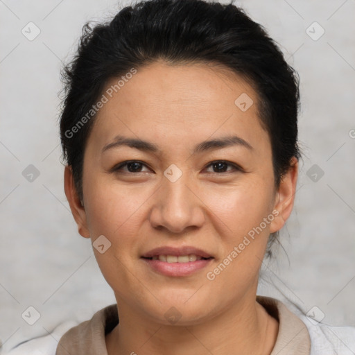 Joyful white adult female with short  brown hair and brown eyes