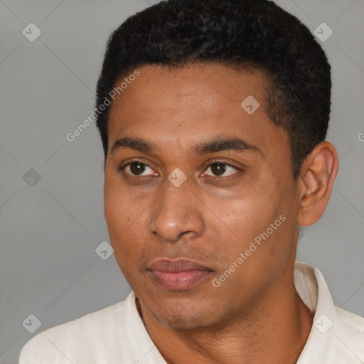 Neutral latino young-adult male with short  black hair and brown eyes