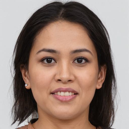 Joyful white young-adult female with medium  brown hair and brown eyes