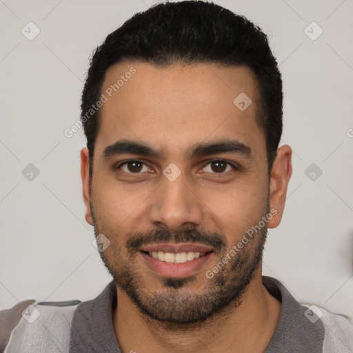 Joyful white young-adult male with short  black hair and brown eyes