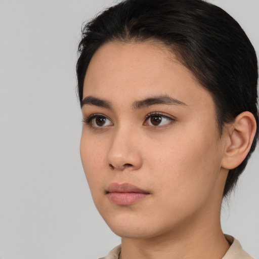 Neutral asian young-adult female with short  brown hair and brown eyes