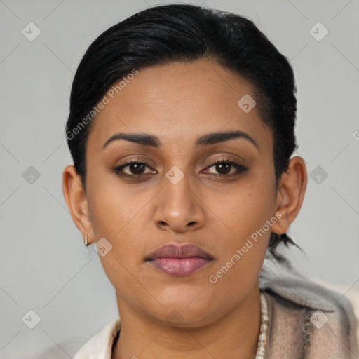 Joyful latino young-adult female with short  brown hair and brown eyes