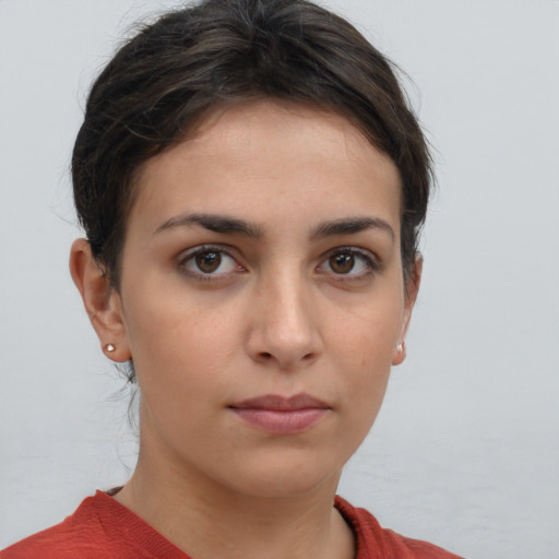 Neutral white young-adult female with short  brown hair and brown eyes