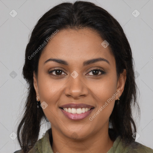 Joyful latino young-adult female with long  brown hair and brown eyes