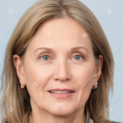 Joyful white adult female with medium  brown hair and grey eyes