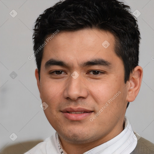 Joyful white young-adult male with short  black hair and brown eyes