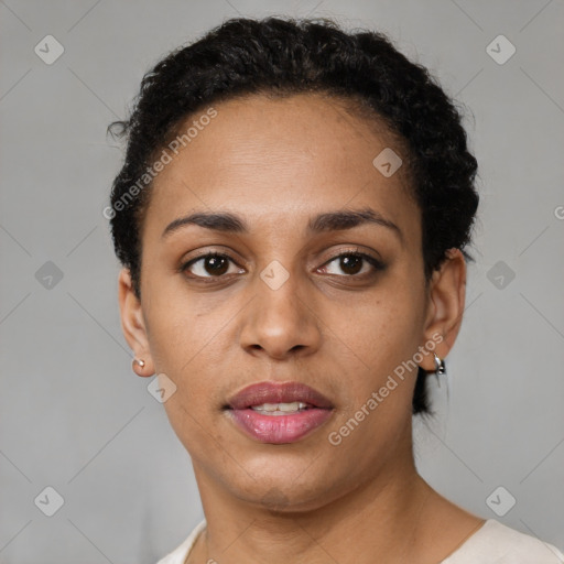 Joyful latino young-adult female with short  brown hair and brown eyes