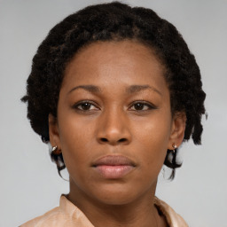 Neutral black young-adult female with short  brown hair and brown eyes