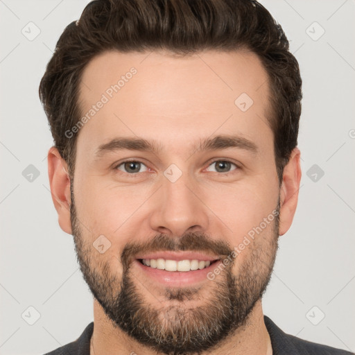 Joyful white young-adult male with short  brown hair and brown eyes