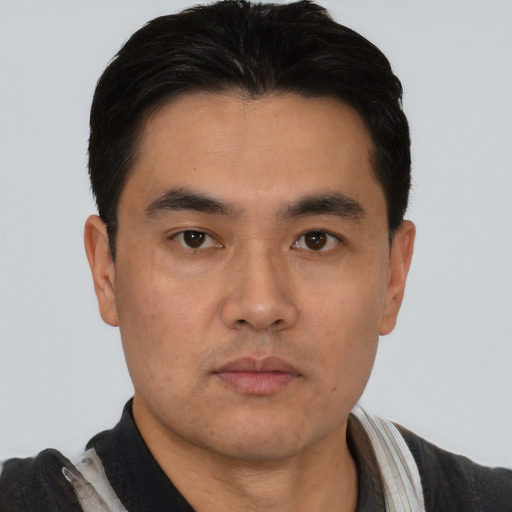 Neutral asian young-adult male with short  black hair and brown eyes