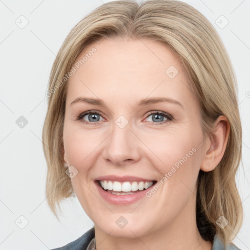 Joyful white young-adult female with medium  brown hair and blue eyes