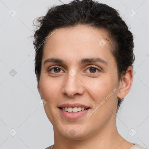 Joyful white young-adult female with short  brown hair and brown eyes