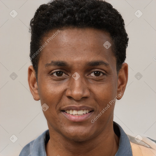 Joyful black young-adult male with short  black hair and brown eyes