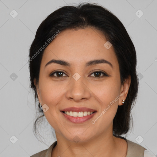 Joyful latino young-adult female with medium  brown hair and brown eyes