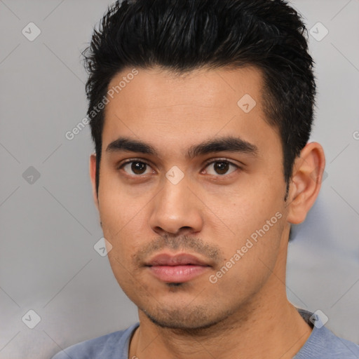 Neutral latino young-adult male with short  black hair and brown eyes