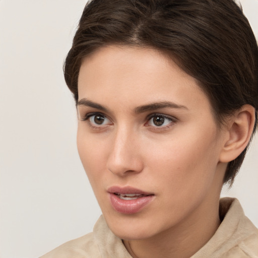 Neutral white young-adult female with short  brown hair and brown eyes