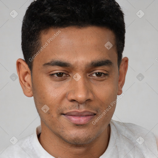 Joyful latino young-adult male with short  black hair and brown eyes