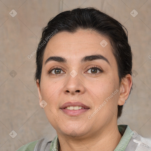 Joyful white adult female with short  brown hair and brown eyes