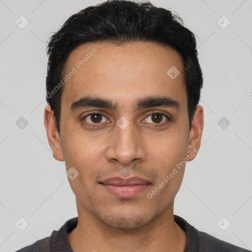 Joyful latino young-adult male with short  black hair and brown eyes