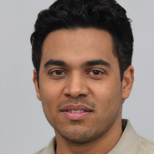 Neutral latino young-adult male with short  black hair and brown eyes