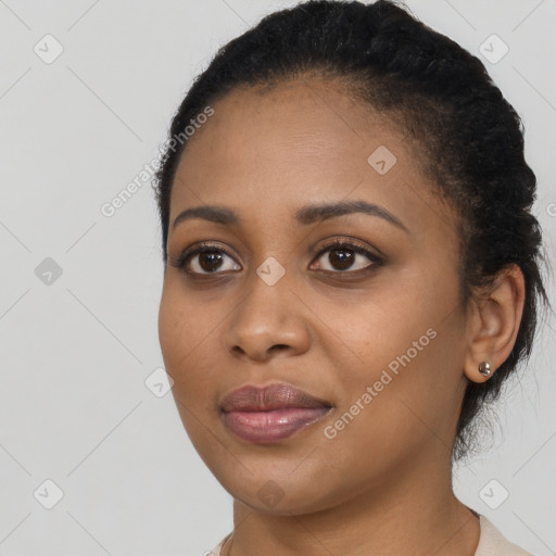 Joyful latino young-adult female with short  black hair and brown eyes