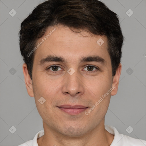 Joyful white young-adult male with short  brown hair and brown eyes